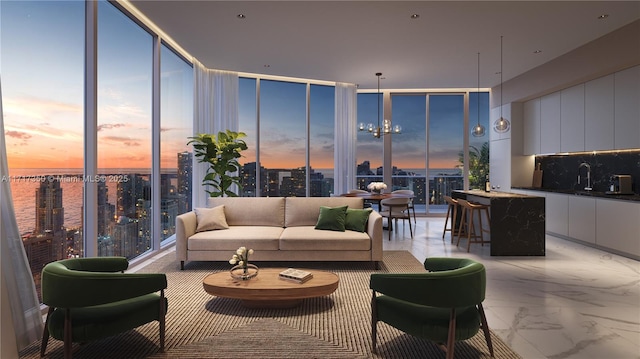 living room with a water view and a chandelier