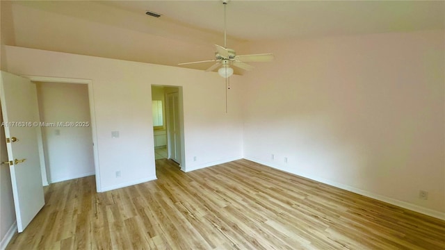 unfurnished bedroom with ceiling fan and light wood-type flooring