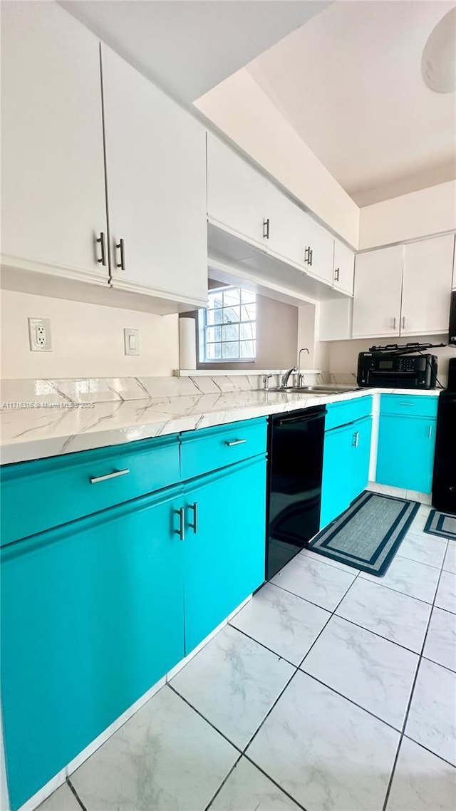 kitchen featuring black appliances, white cabinets, blue cabinets, sink, and light stone countertops