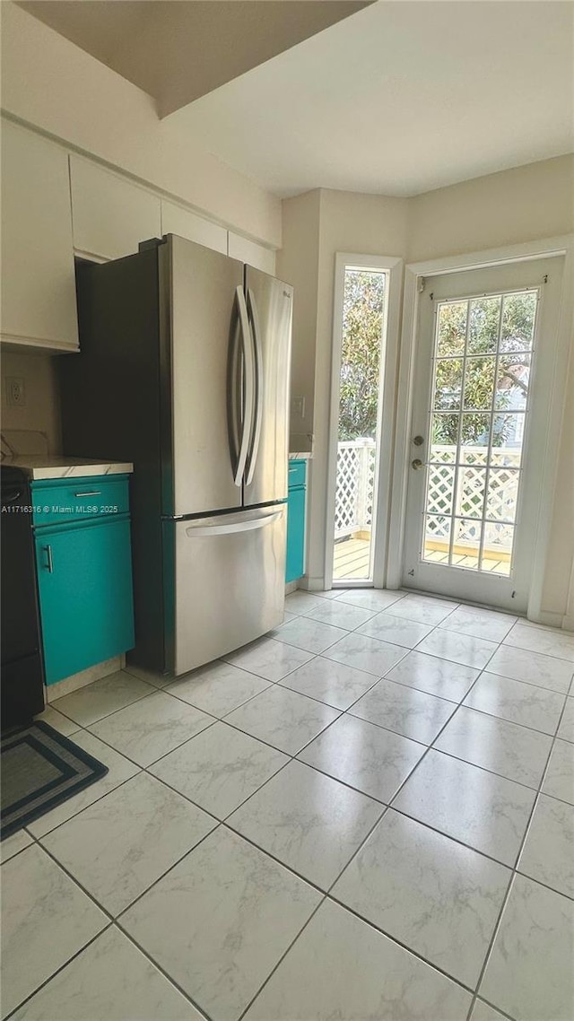 kitchen featuring stainless steel fridge