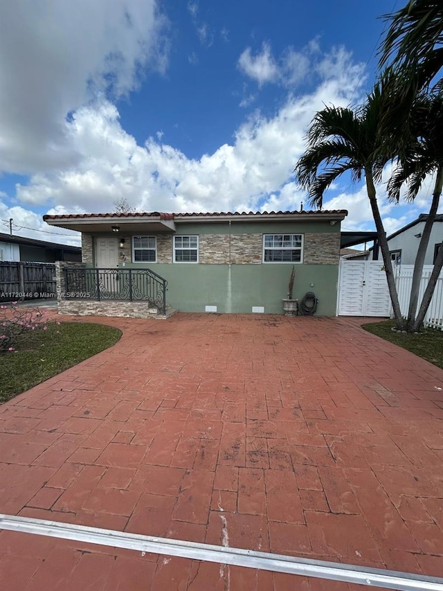 view of front facade featuring a patio area