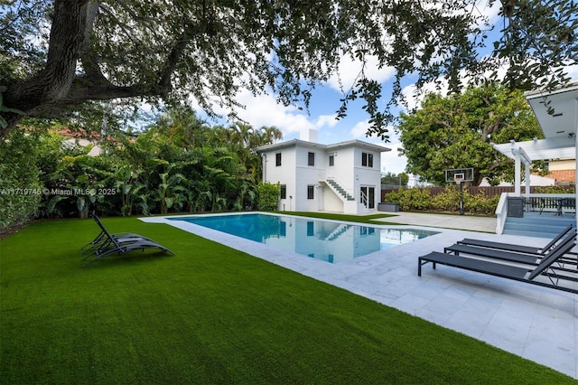 mediterranean / spanish-style home featuring a front yard