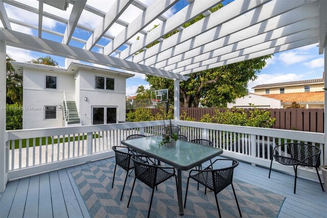 wooden terrace featuring a pergola