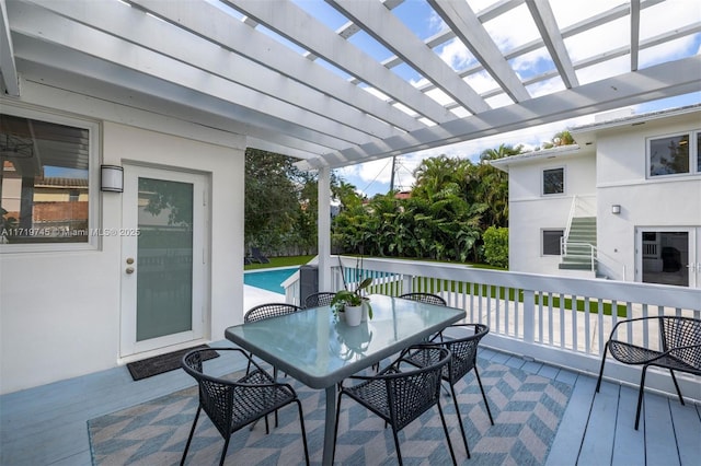 wooden terrace with a pergola