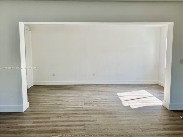 spare room featuring light hardwood / wood-style floors