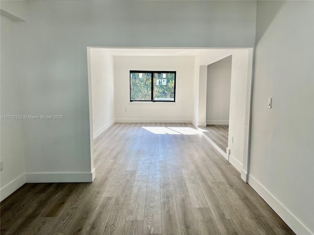 empty room with light wood-type flooring