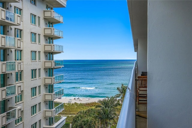 property view of water featuring a beach view