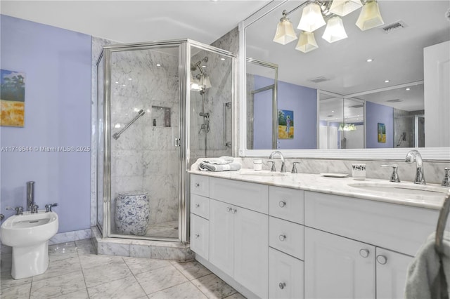 bathroom featuring vanity, a shower with door, and a bidet