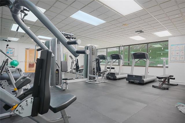 exercise room featuring a wall of windows