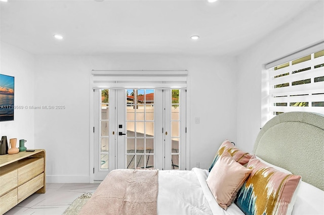 tiled bedroom featuring access to outside