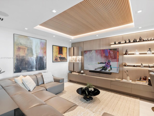 living room with recessed lighting, baseboards, a raised ceiling, and wooden ceiling