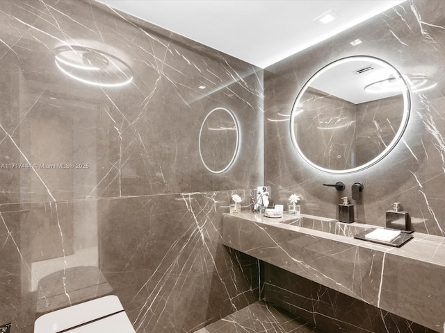 19955 NE 38th Ct Unit 1103, Aventura, FL 33180 - bathroom featuring toilet and tile walls