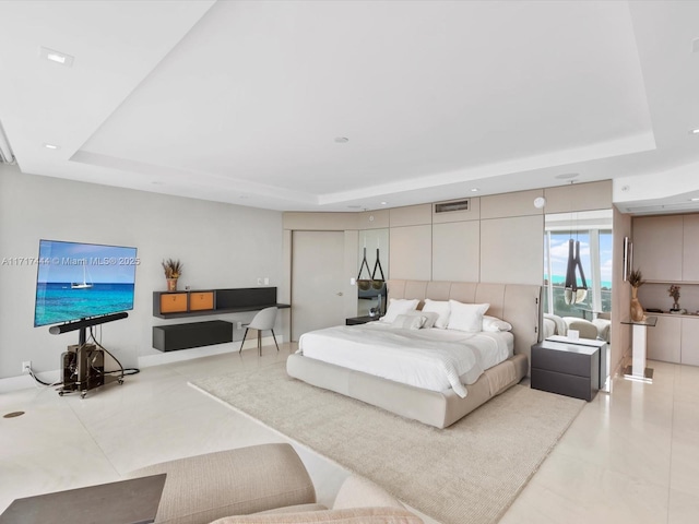 bedroom featuring visible vents, recessed lighting, and a raised ceiling