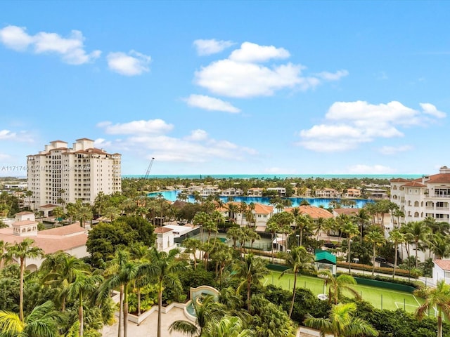 birds eye view of property featuring a water view