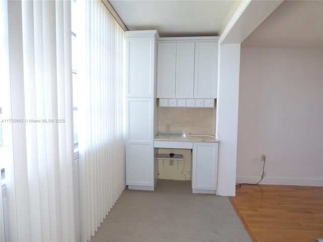 hall featuring light hardwood / wood-style flooring