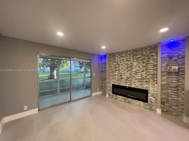 unfurnished living room with a fireplace