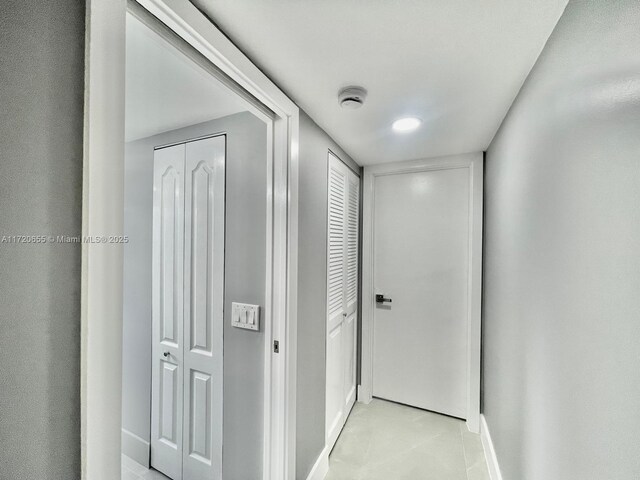 room details featuring stacked washer and dryer