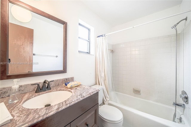 full bathroom with vanity, shower / bathtub combination with curtain, and toilet