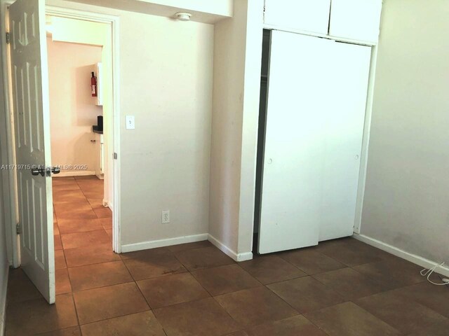 unfurnished bedroom featuring a closet