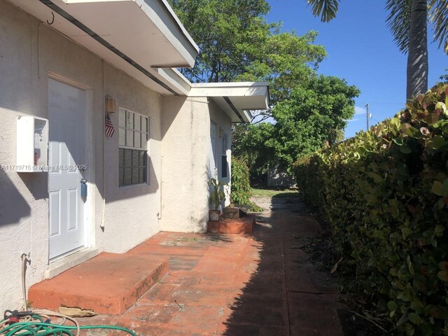 view of home's exterior with a patio