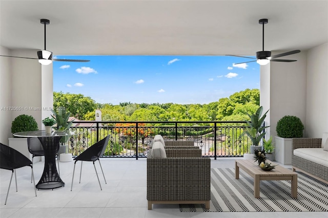 balcony featuring ceiling fan