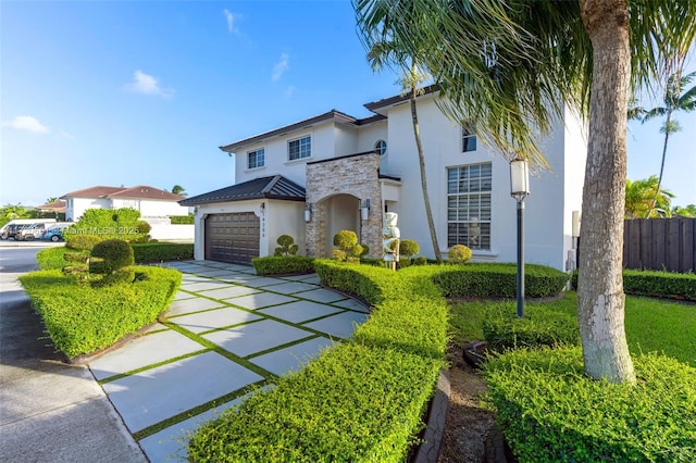 mediterranean / spanish-style home featuring a garage