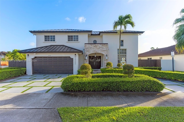 view of front of property featuring a garage