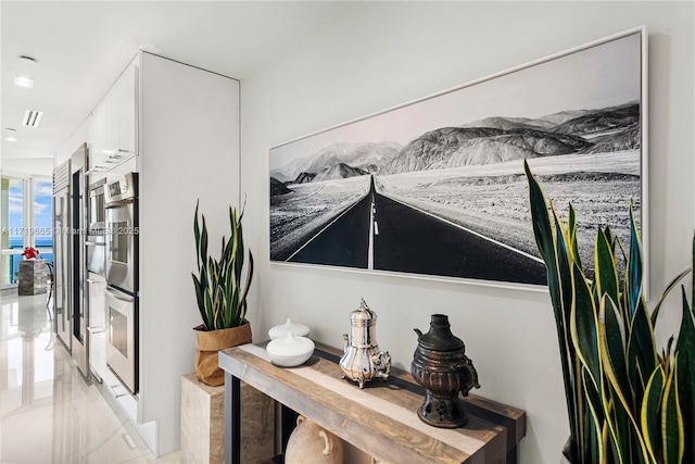 interior details with double oven and french doors