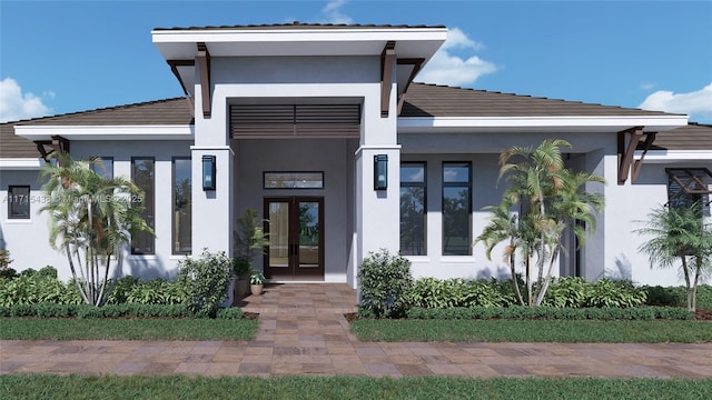 view of exterior entry with french doors