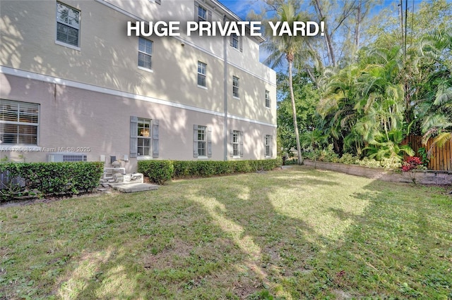 view of yard featuring fence