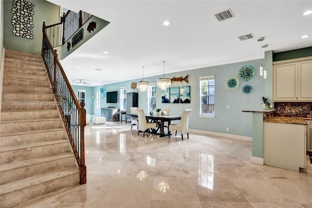 bedroom with visible vents, ornamental molding, baseboards, and access to outside