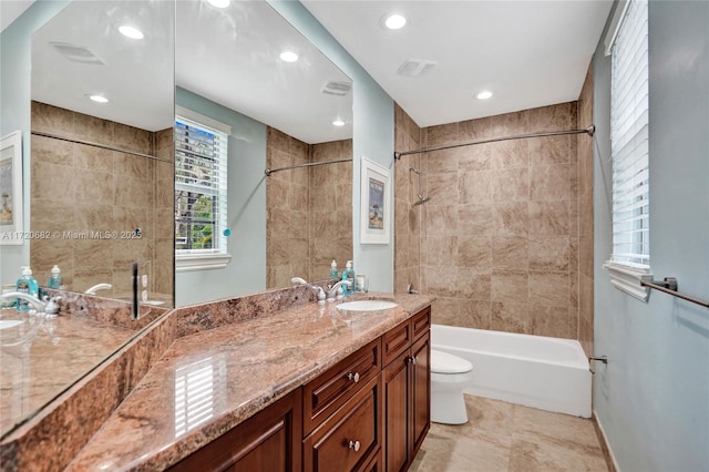 full bathroom featuring recessed lighting, toilet, vanity, and bathtub / shower combination