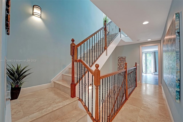 doorway with visible vents, french doors, and baseboards