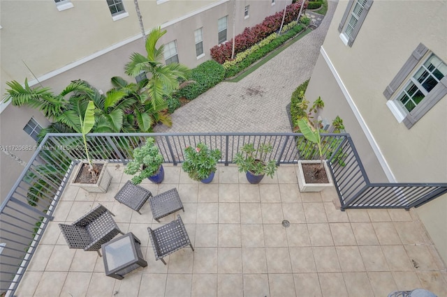 view of patio / terrace with a balcony