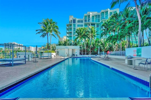 view of swimming pool featuring a patio