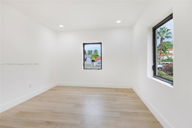 empty room with light wood-type flooring