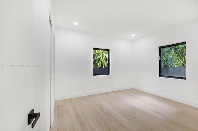 empty room with light wood-type flooring