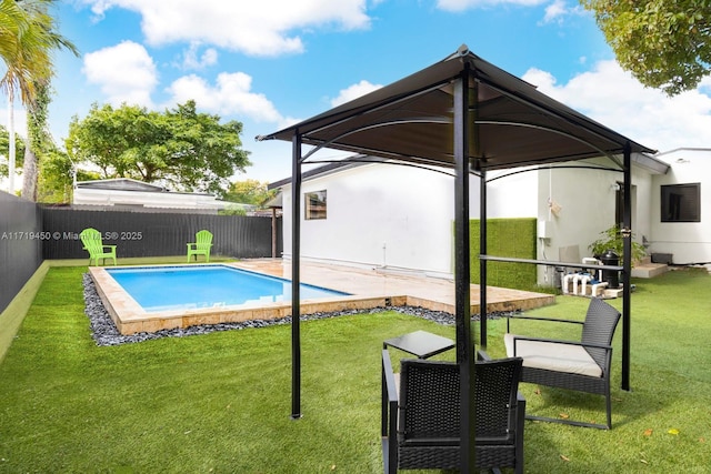 view of pool featuring a gazebo, a yard, and a patio