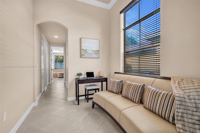 tiled living room with crown molding