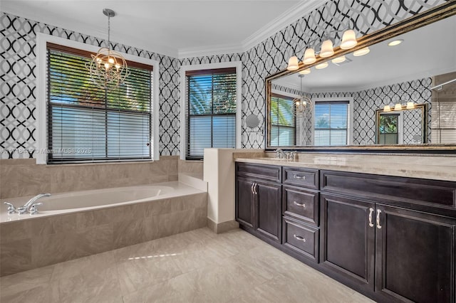 bathroom with vanity, tiled bath, crown molding, and a notable chandelier