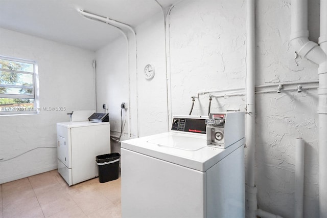 laundry room featuring washing machine and dryer