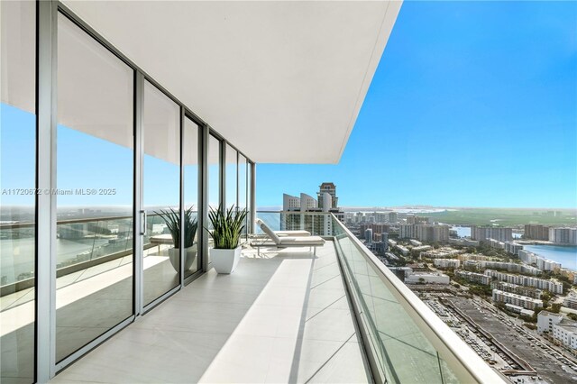 balcony featuring a water view