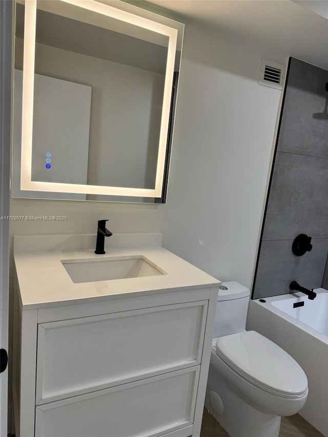 full bathroom with vanity, toilet, and bathing tub / shower combination