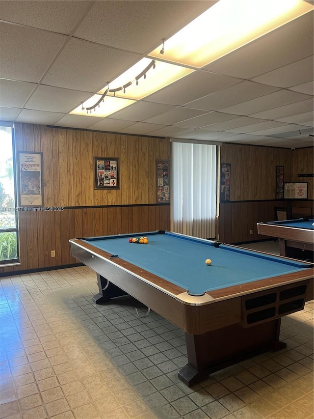 rec room featuring a paneled ceiling, wood walls, and billiards