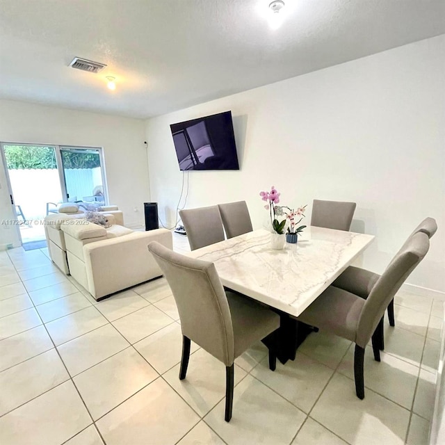 view of tiled dining area