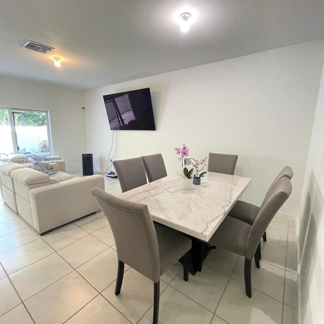 view of tiled dining room