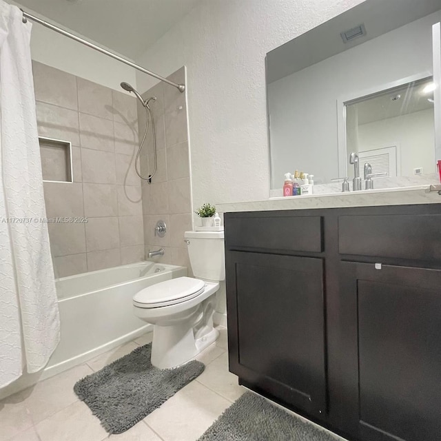 full bathroom with tile patterned floors, shower / bath combination with curtain, toilet, and vanity