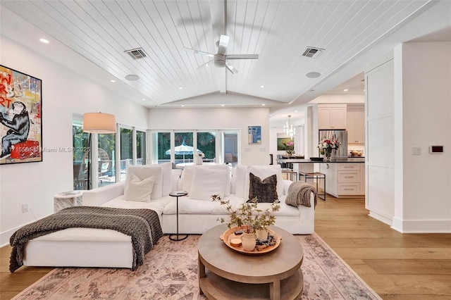 living room featuring lofted ceiling, wooden ceiling, ceiling fan, and light hardwood / wood-style flooring