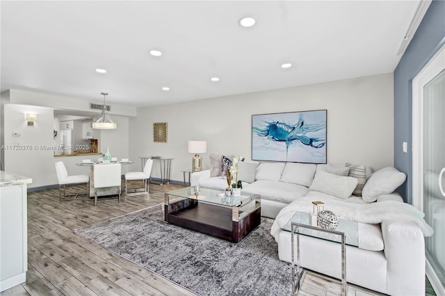 living room featuring light wood-type flooring