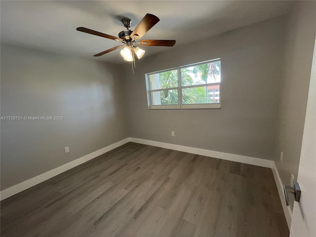 unfurnished room with ceiling fan and hardwood / wood-style floors